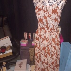 Elegant Brown and White Paisley Maxi Dress with Cutouts On Each Side Of Waist.